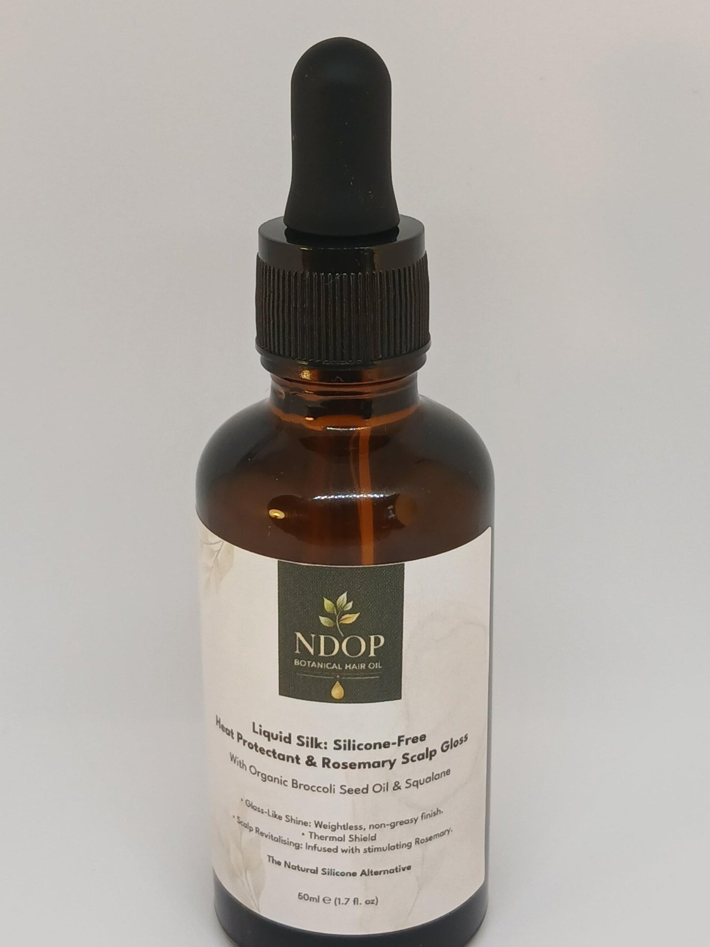 Liquid Silk: Silicone-Free Heat Protectant & Rosemary Scalp Gloss - Ndop Botanical Hair Oil