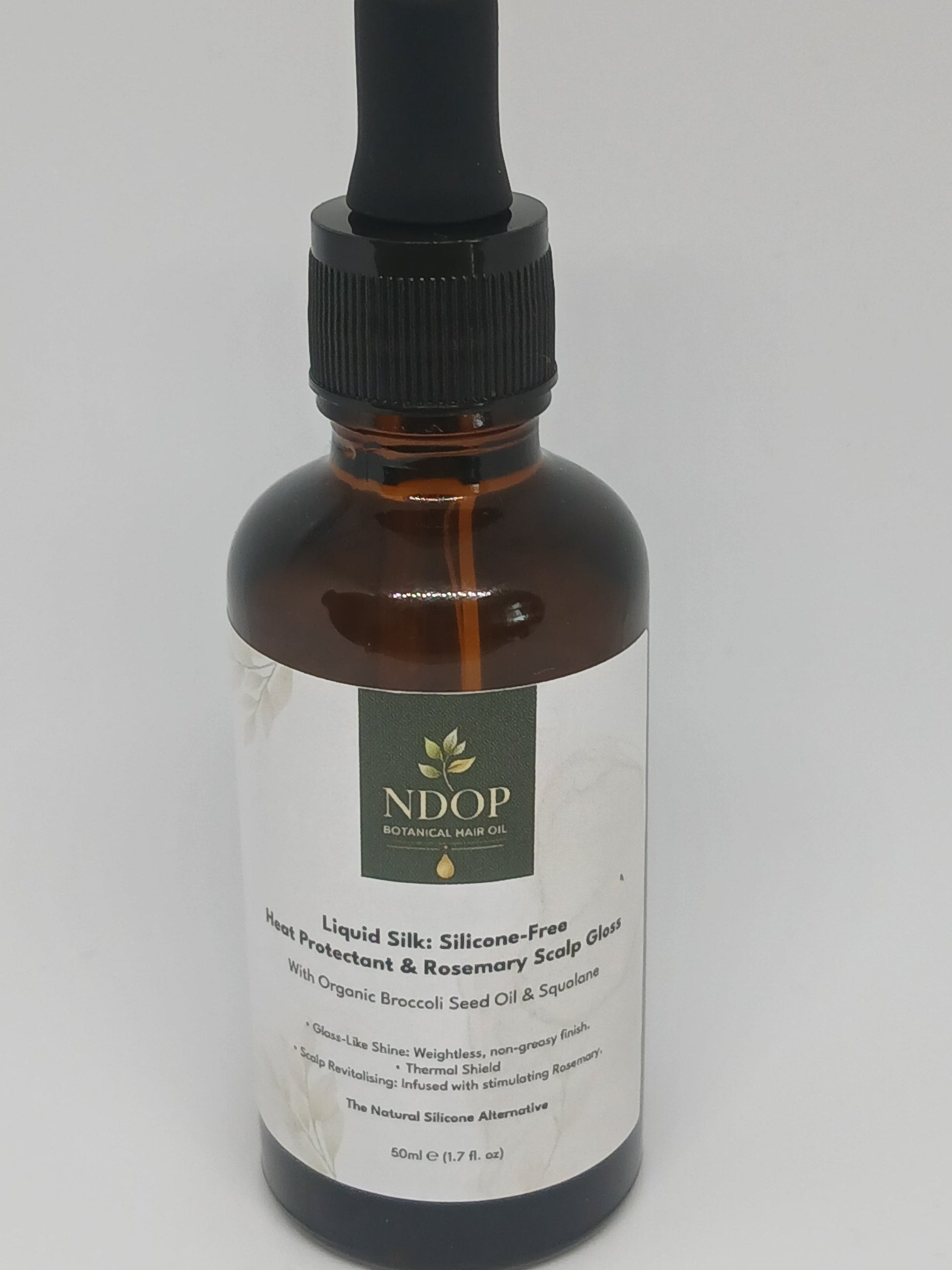 Bottle of NDOP liquid silk heat protectant